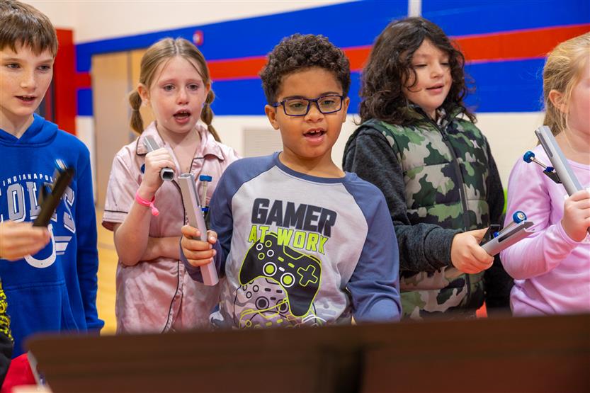 Students play instruments